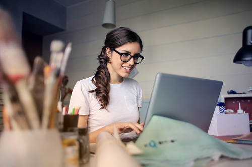 a young woman running an online business